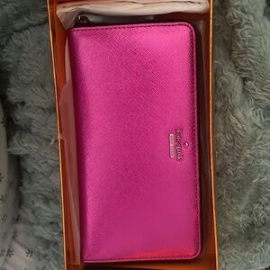 Kate Spade Wallet Gorgeous metallic Hot Pink with black trim.  Brand new.